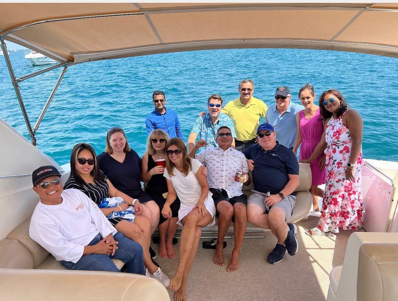 The ISG team on the deck of a boat on Lake Michigan