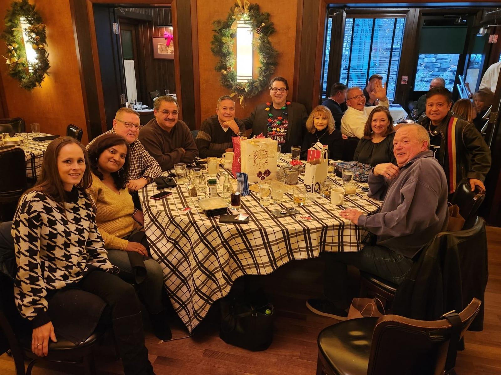 ISG teammates at a holiday dinner