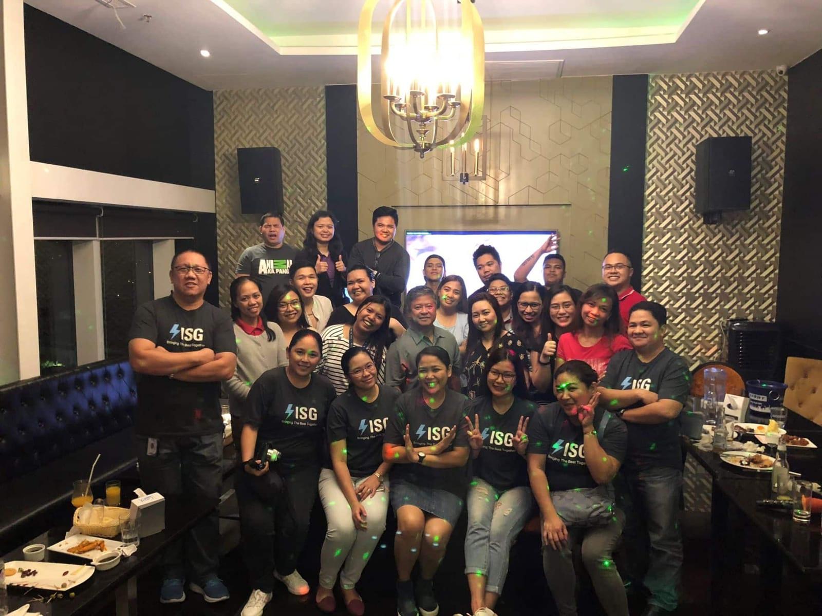The ISG Manila team in matching ISG shirts